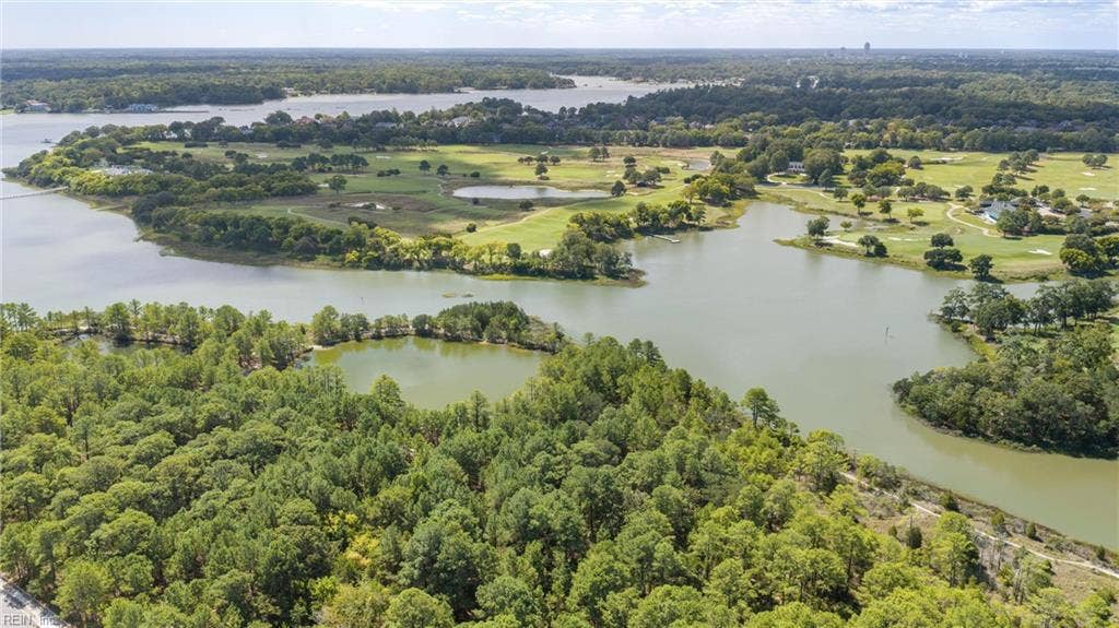 Pleasure House Creek divides the preserved, coastal maritime forest of Pleasure House Point and the protected Bayville Golf Course.