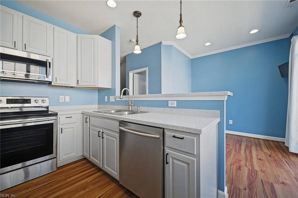 4804 Almandine Avenue, Virginia Beach, VA 23462 PENDANT LIGHTING, DOUBLE SINK, PULL-OUT FAUCET & GARBAGE DISPOSAL