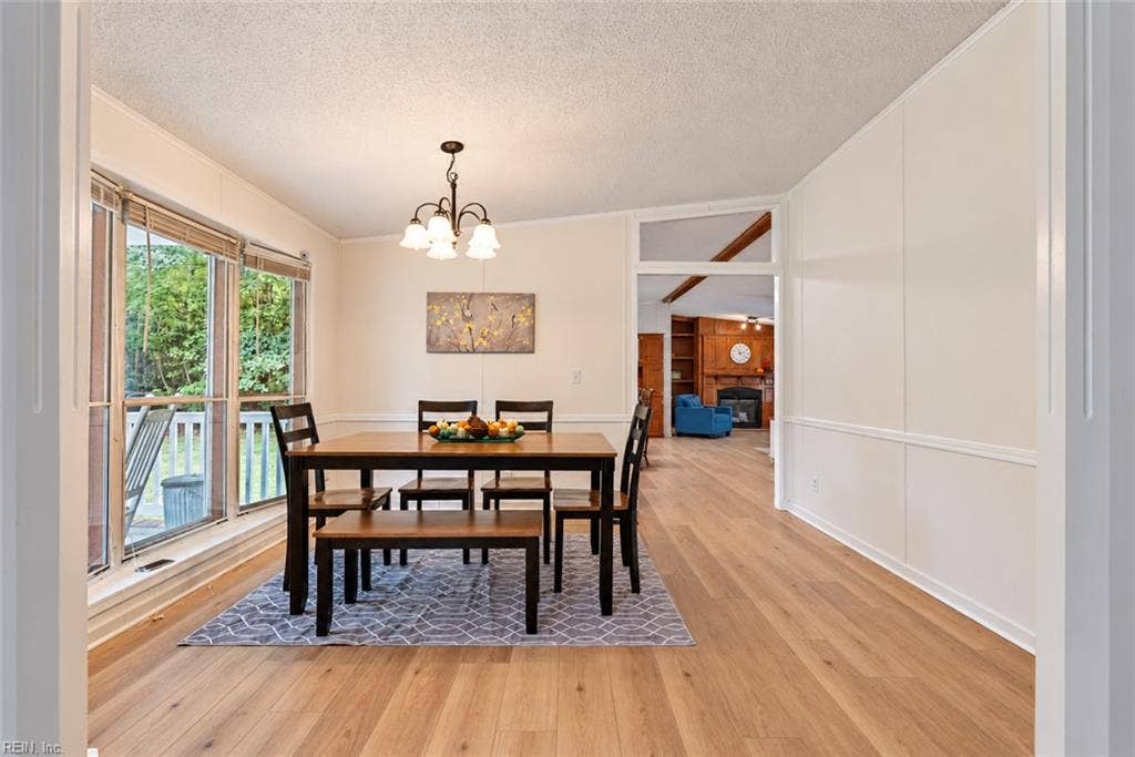 Dining room at the entry with large windows
