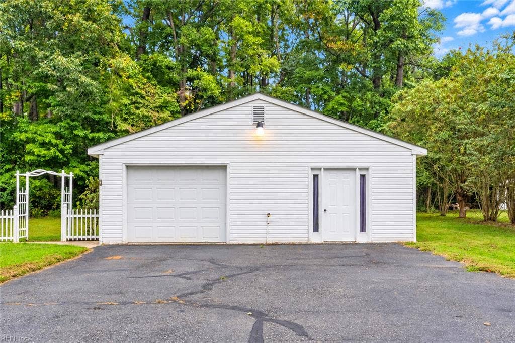 Detached 1 car oversized garage.  Additonal room could be office, storage, home gym just to mention a few ideas