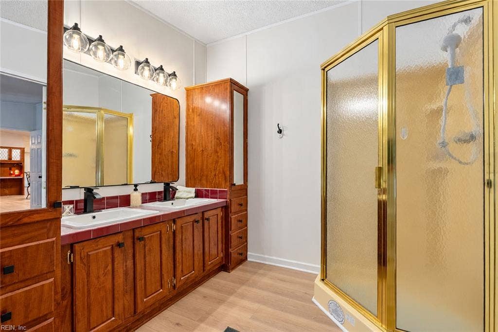 Spacious primary bathroom with shower and soaking tub
