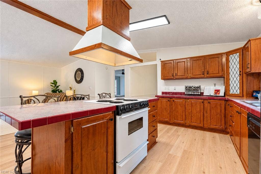 With this open layout, nobody gets left out in the kitchen during a party