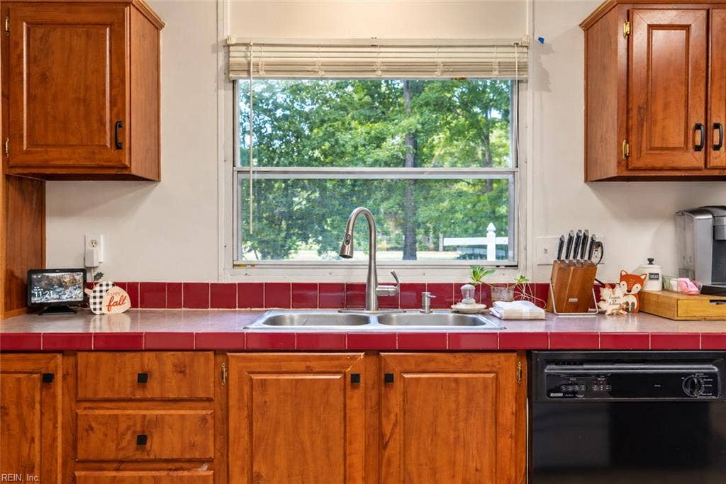 View of front yard from sink