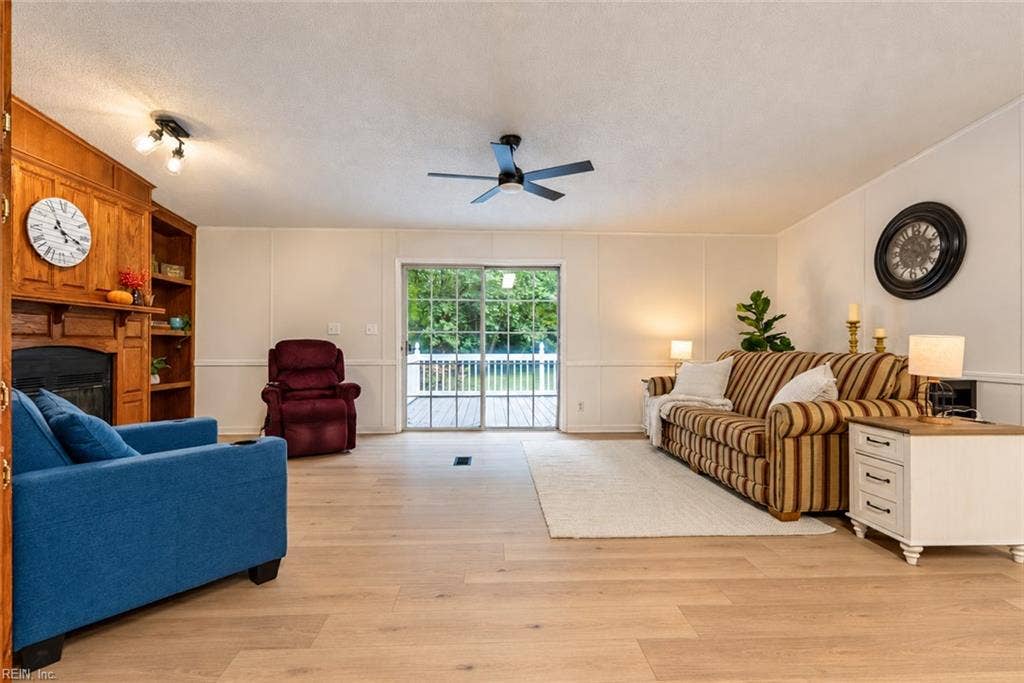 Family room with sliding glass door to the back deck/yard