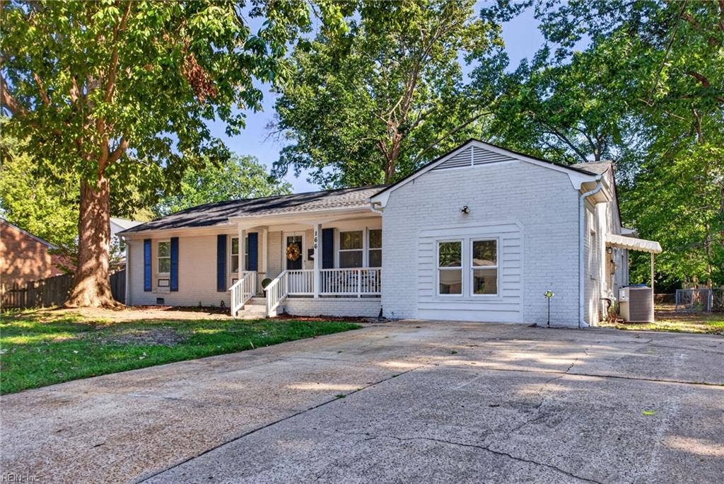 Exterior Front (shows side entrance to Fourth Bedroom)