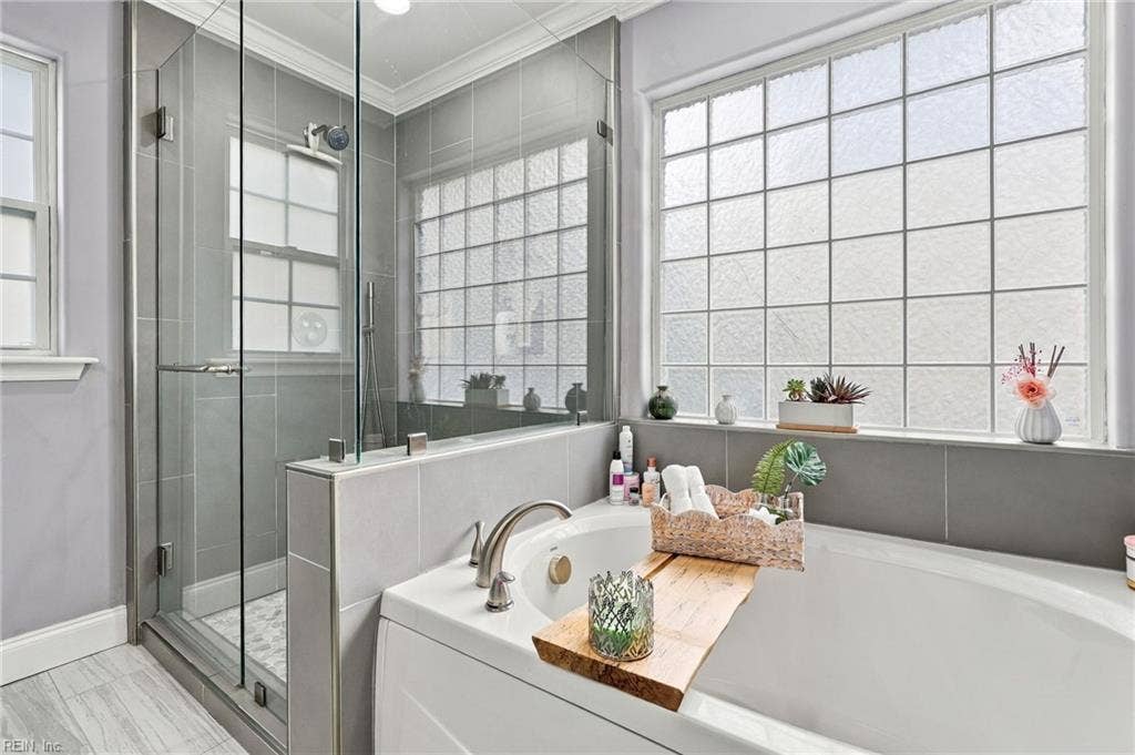 5580 Arboretum Avenue, Virginia Beach, VA 23455 Gorgeous shower with seamless glass and LVT and a soaking tub