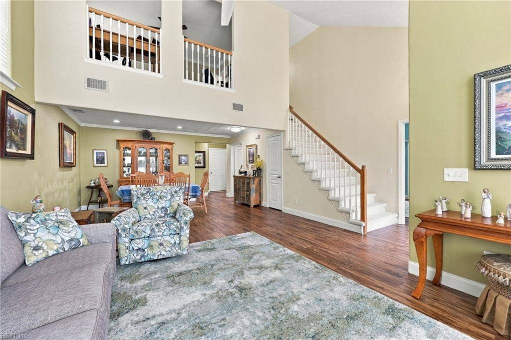 5580 Arboretum Avenue, Virginia Beach, VA 23455 Living room and dining room connect for easy entertaining