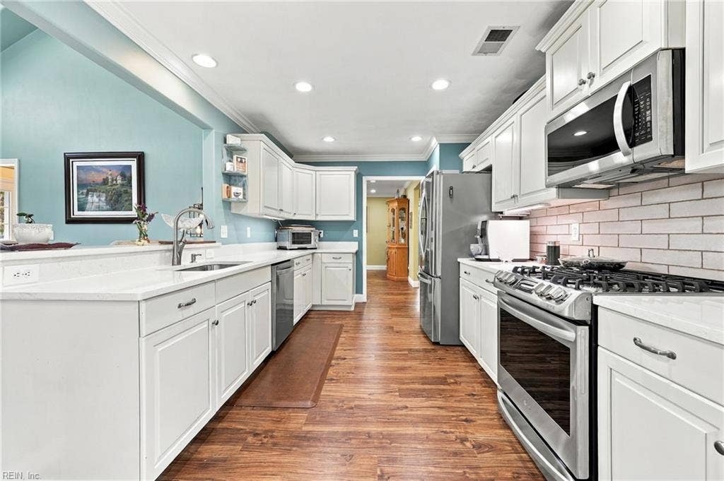 5580 Arboretum Avenue, Virginia Beach, VA 23455 LVP throughout downstairs even in the kitchen