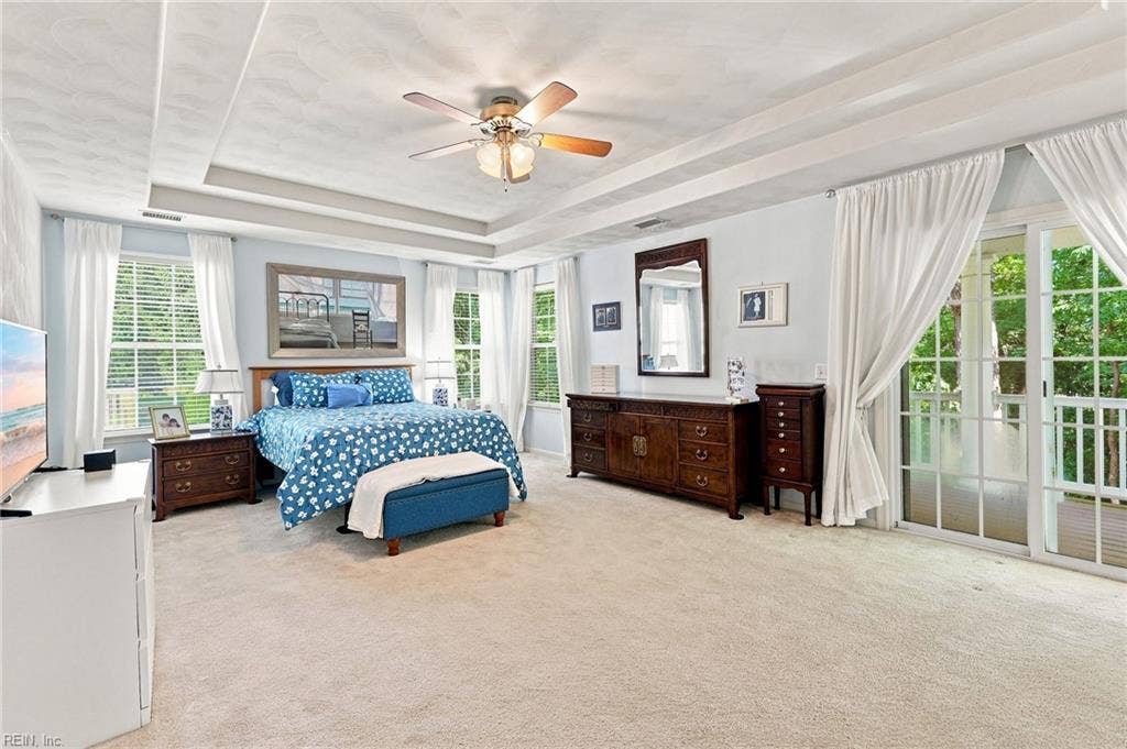 5428 Season Lane, Sajo Farm, Virginia Beach, VA 23455 Primary ensuite with private balcony overlookingwoods and Lake Lawson