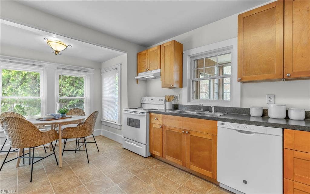 317 George Washington Highway S, Chesapeake, VA 23323 The kitchen is spacious, functional, and features bright white appliances.