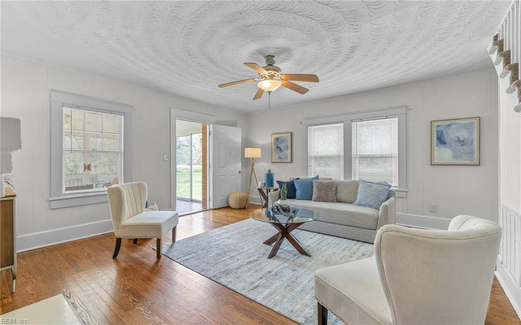 317 George Washington Highway S, Chesapeake, VA 23323 Natural light, original hardwoods and a comfortable footprint make this living room an easy everyday gathering space.