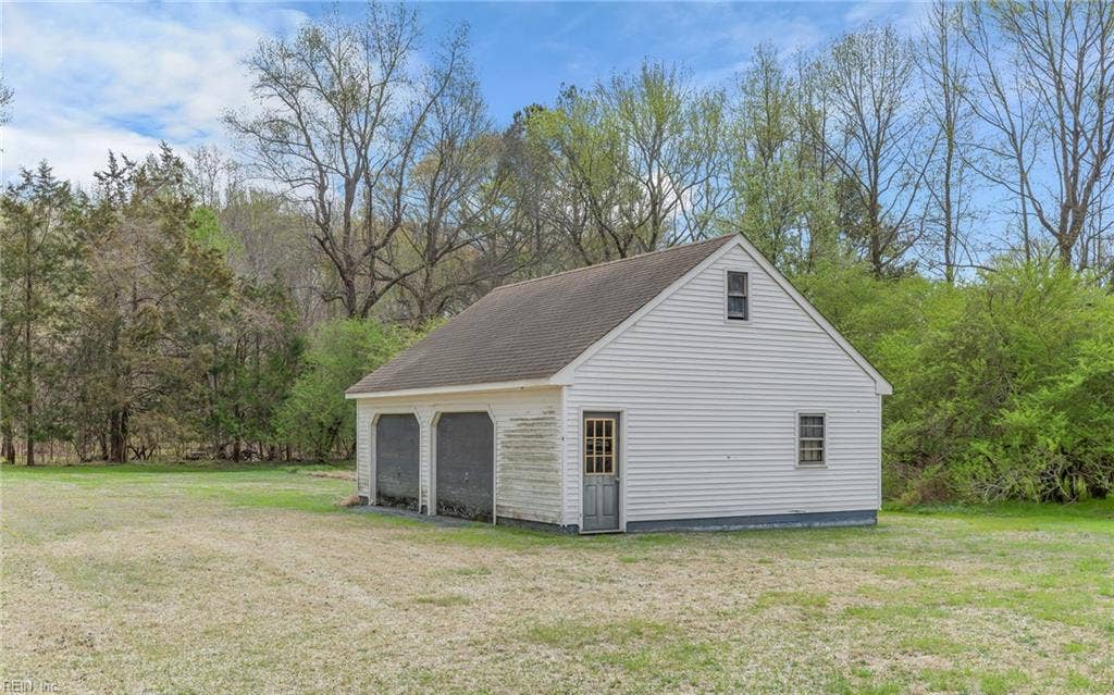 317 George Washington Highway S, Chesapeake, VA 23323 The large powered detached garage/workshop is a major feature of the property, offering substantial room for tools, projects, equipment, storage and hands-on hobbies.