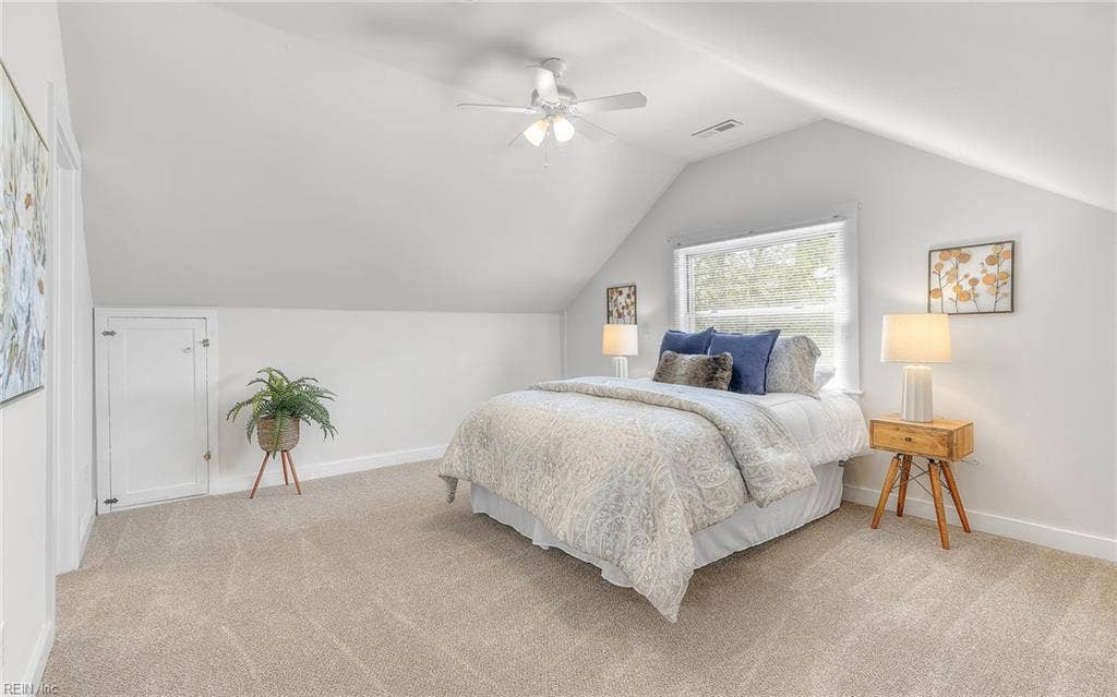317 George Washington Highway S, Chesapeake, VA 23323 Upstairs, this spacious bedroom brings in plenty of natural light and the charm of a classic Cape Cod roofline.