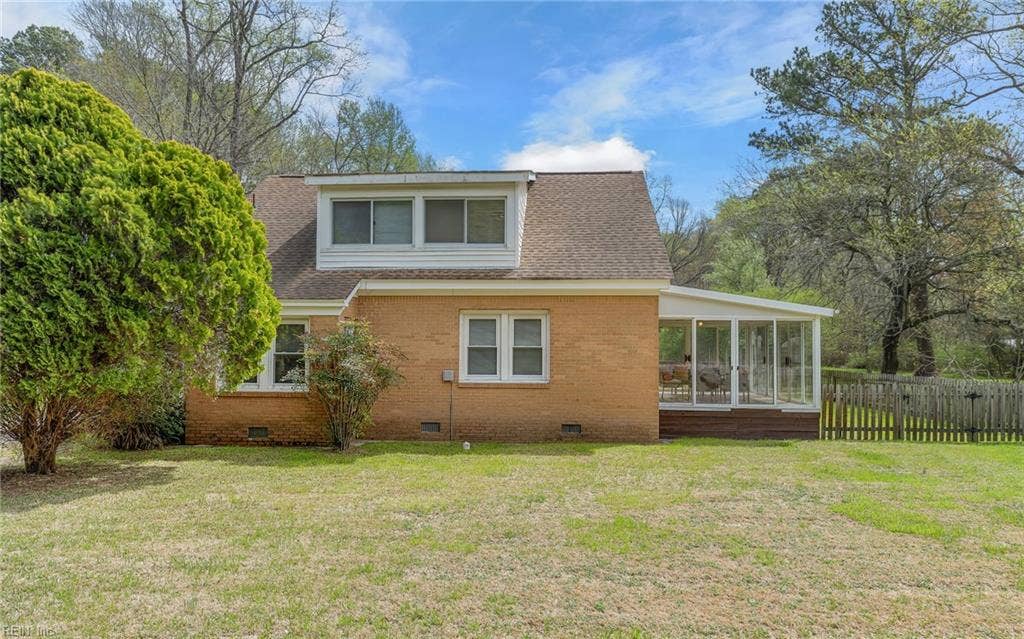 317 George Washington Highway S, Chesapeake, VA 23323 Brick brings a timeless, low-fuss exterior finish that suits the home’s classic shape and acreage setting.