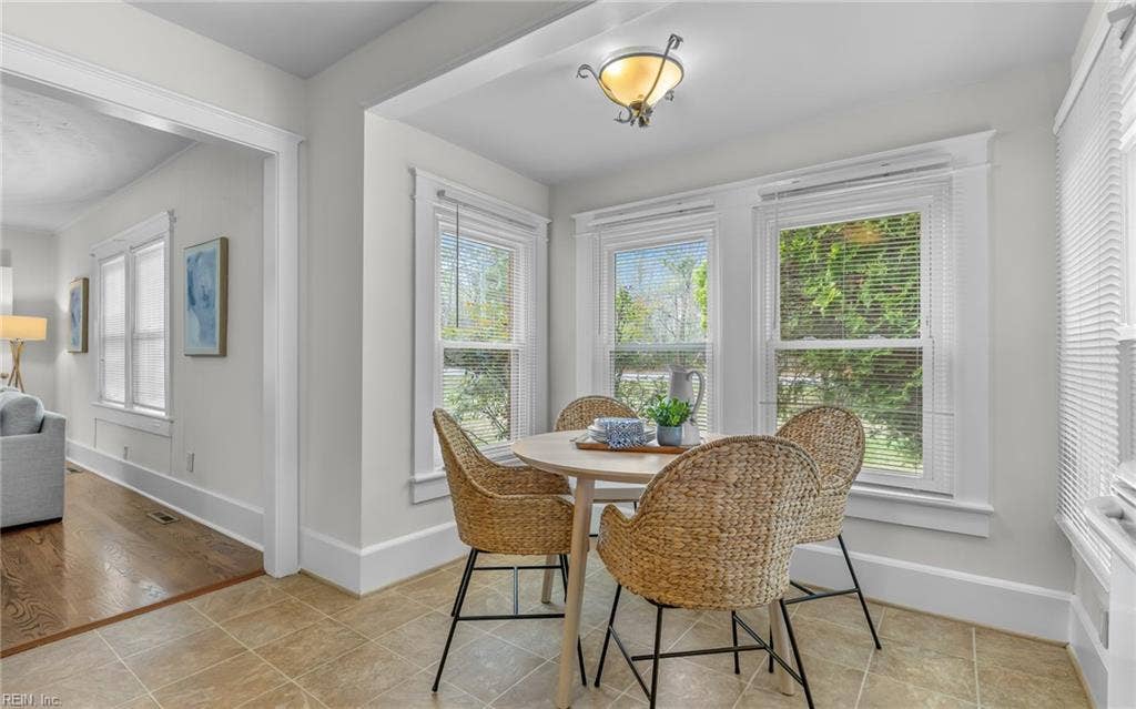 317 George Washington Highway S, Chesapeake, VA 23323 A bright breakfast nook is framed by windows, bringing in natural light.