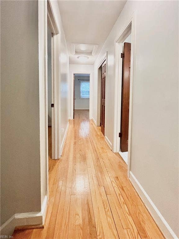 Hallway upstairs leads to 3 spacious bedrooms.