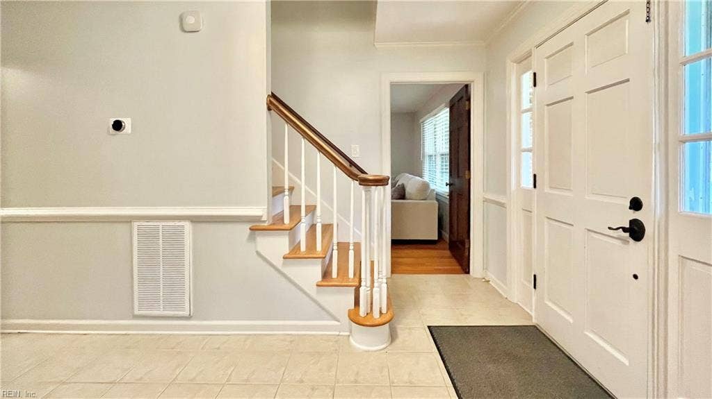 Entryway also opens up to the great room to the right.