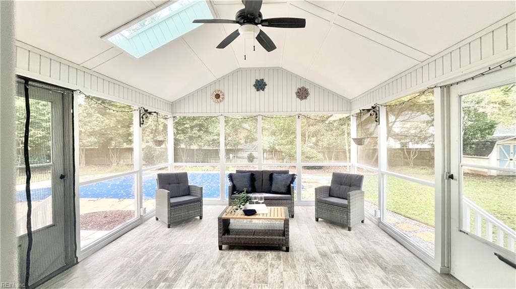 Screen-in porch overlooking the pool