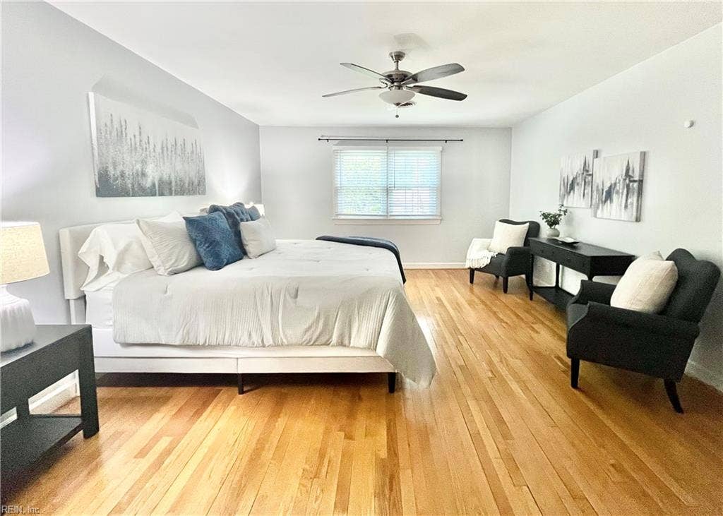 Primary bedroom as you exit the primary bath