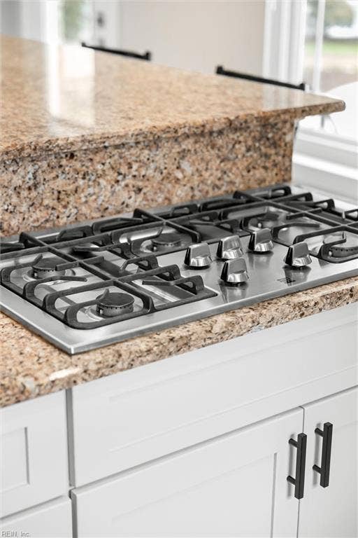 2309 Valle Rio Way, Virginia Beach, VA 23456 A five-burner gas cooktop offers responsive heat and room to prepare several dishes at once.