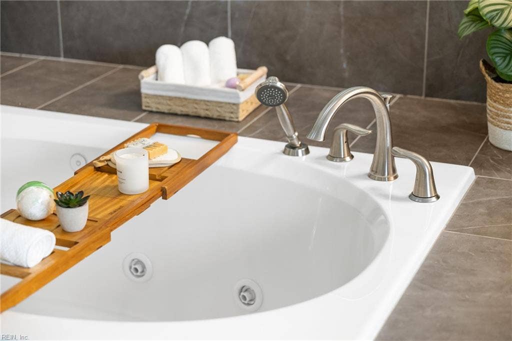 2309 Valle Rio Way, Virginia Beach, VA 23456 A deep soaking tub offers a place to unwind, with a separate shower for everyday convenience.