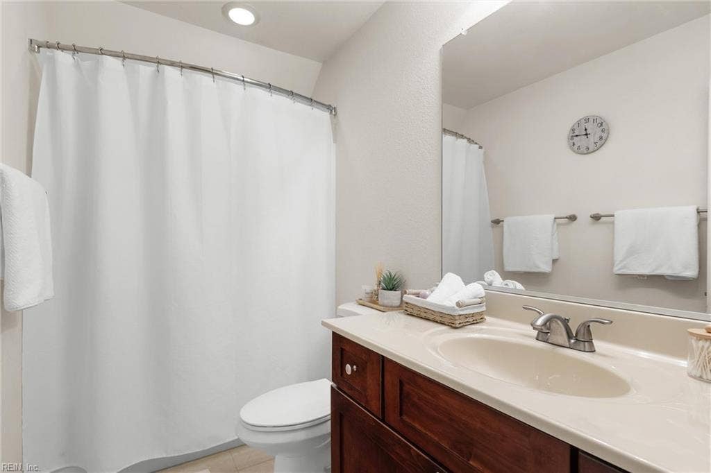 2309 Valle Rio Way, Virginia Beach, VA 23456 A full upstairs bathroom with a tub-and-shower combination serves bedrooms and overnight guests.