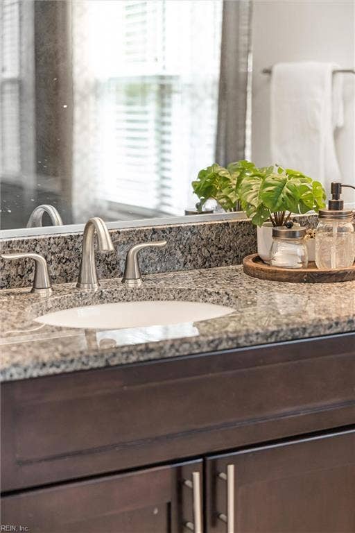 2309 Valle Rio Way, Virginia Beach, VA 23456 Granite countertops and undermount sinks give the primary bath a polished, practical finish.
