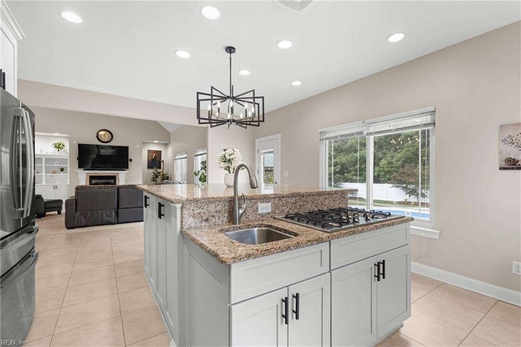 2309 Valle Rio Way, Virginia Beach, VA 23456 Breakfast-bar seating and an open connection to the great room keep the cook part of the conversation.