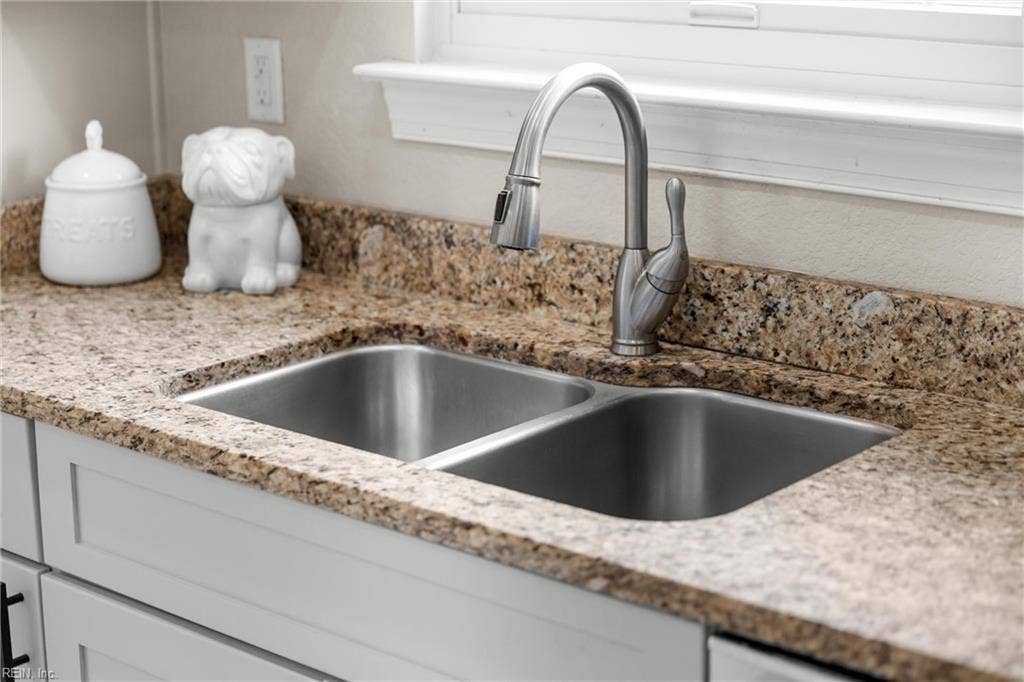 2309 Valle Rio Way, Virginia Beach, VA 23456 A stainless steel double-basin sink and pull-down faucet make everyday prep and cleanup practical.