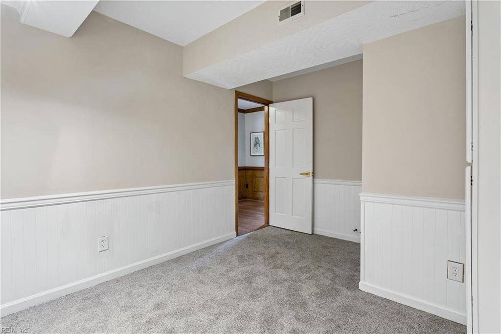 OFFICE LOCATED NEAR THE FOYER.