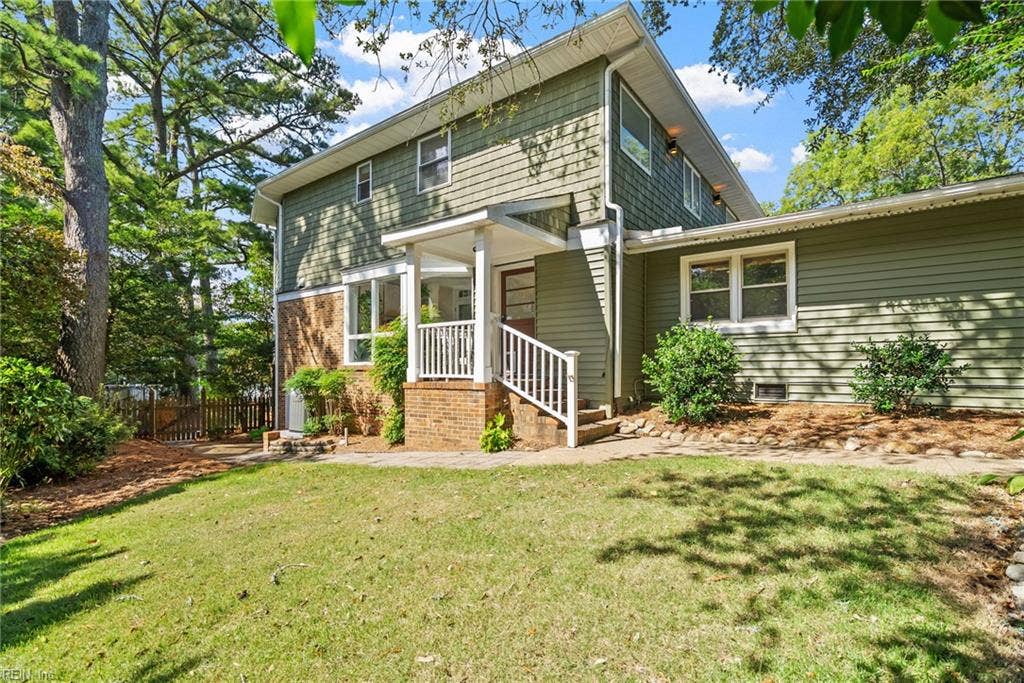 2031 Ridge End Road, Virginia Beach, VA 23454 Side of home. Stairs and entrance to sunroom