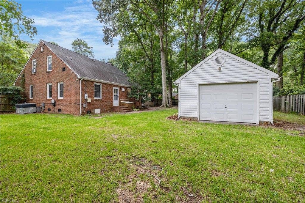Large backyard with detached garage
