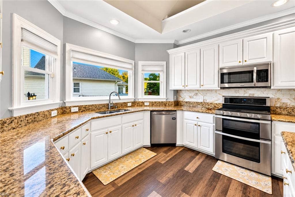 Granite countertops, stainless steel appliances and abundant natural light