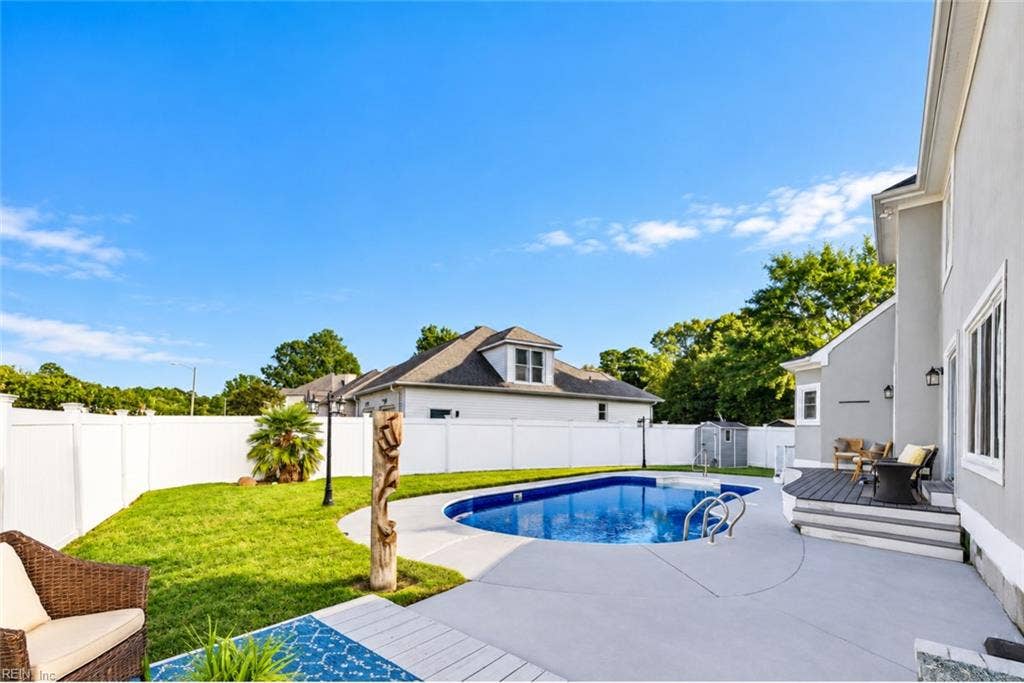 A backyard made for summer days and evenings by the pool