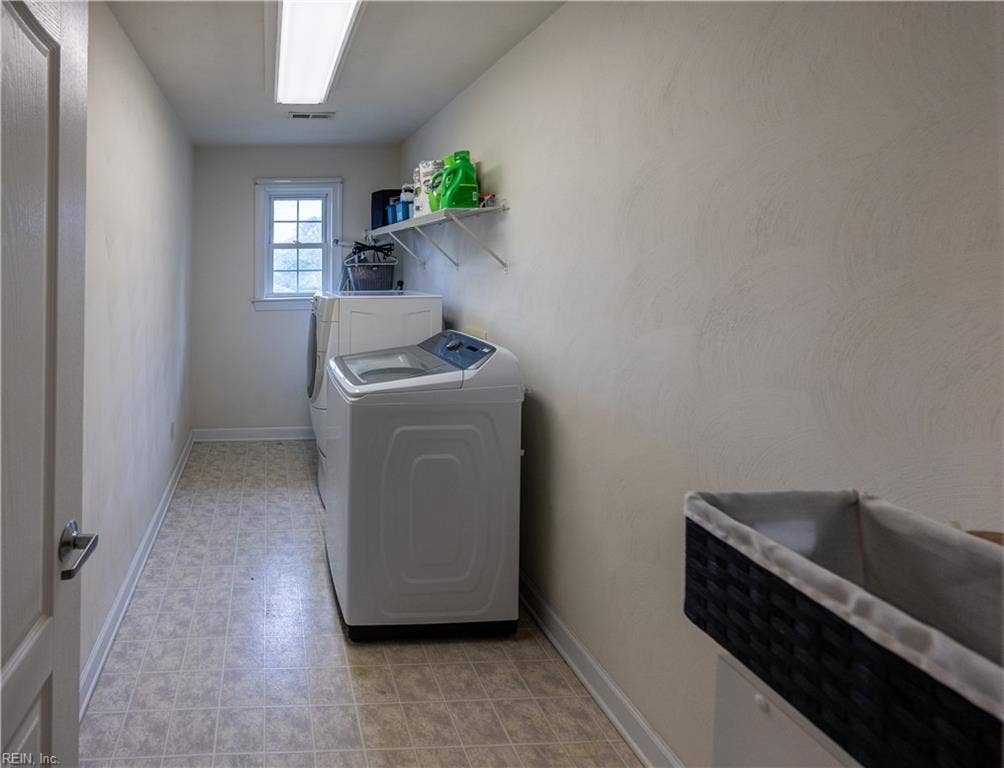 Huge laundry upstairs next to the hall bath
