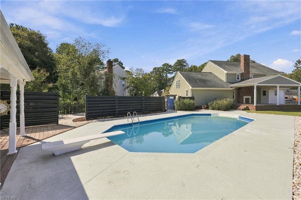 Inground pool complete with a diving board!