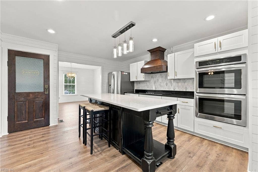 Double oven custom pantry door!
