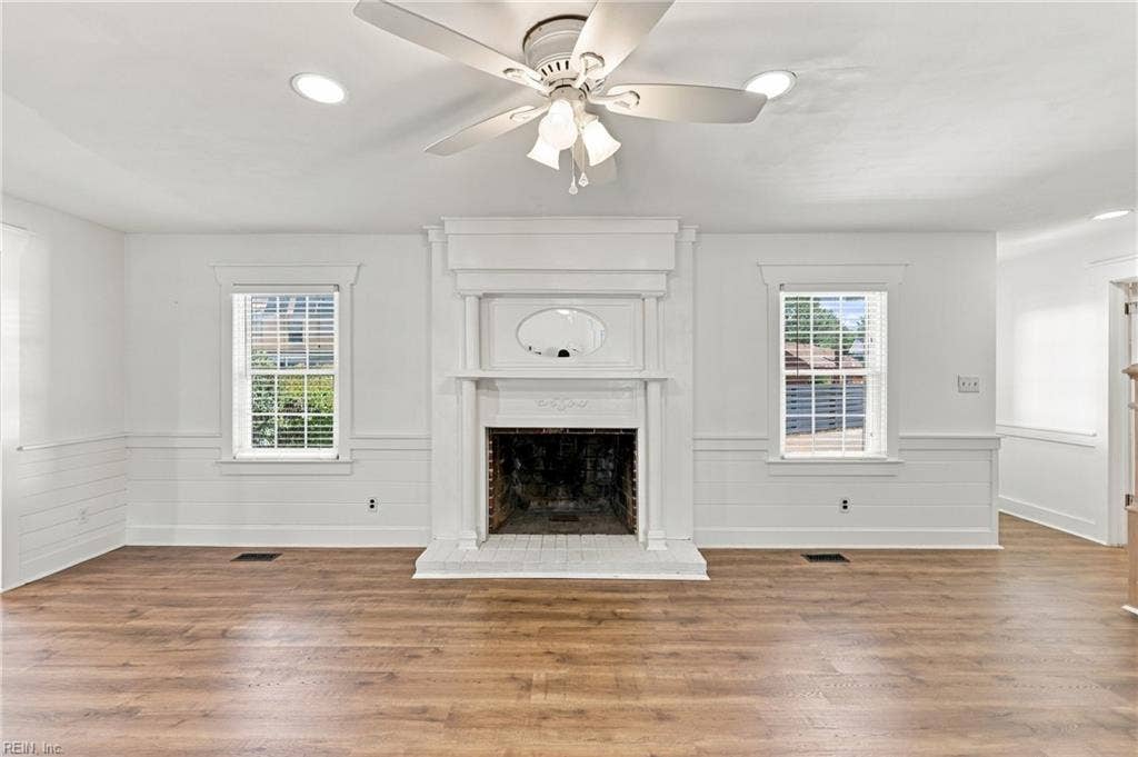 Living room complete with a wood burning fireplace