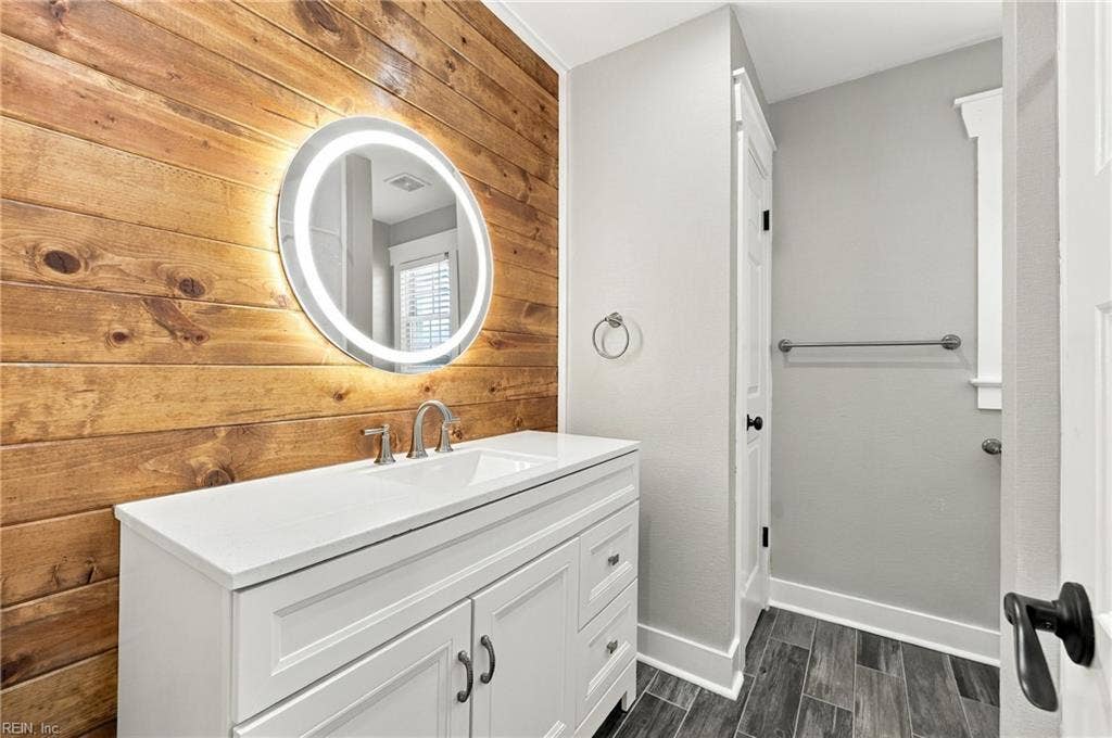 Hallway guest bathroom with custom shiplap and linen textured walls