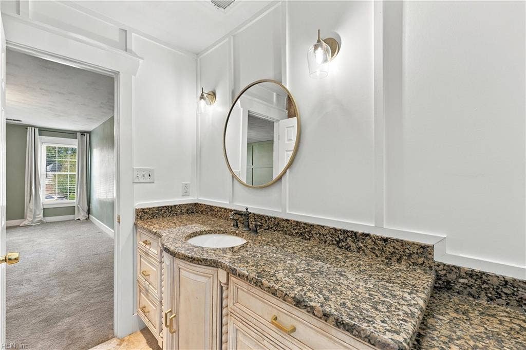 Primary Bathroom with custom sink and vanity area