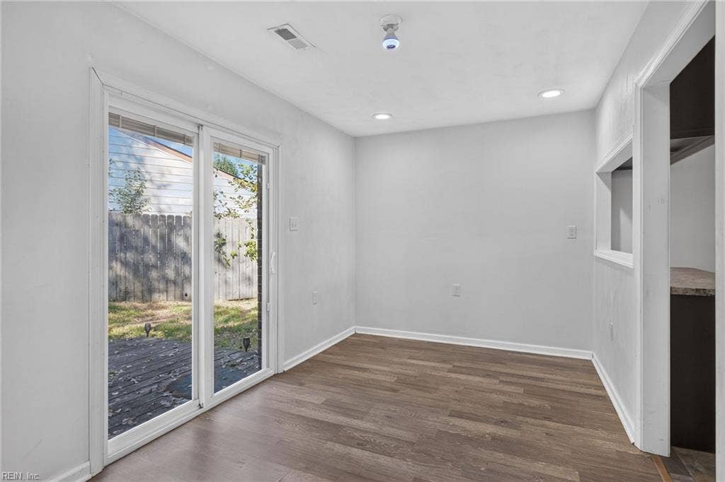 Attached Dining Area with Bright Sliding Door to Backyard
