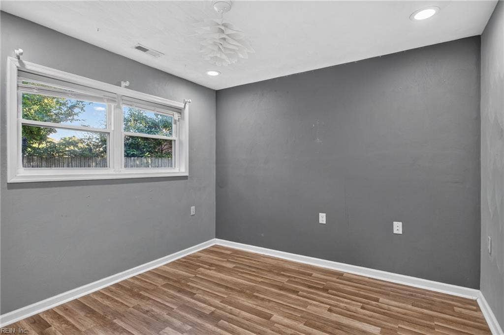 Bedroom 4 - notice the LVP Flooring throughout most of Home