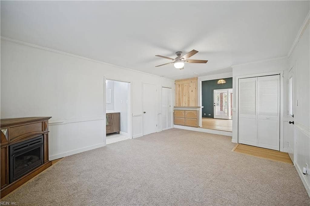 Fourth Bedroom with gas fireplace, ceiling fan with light and ensuite brand new full bath.