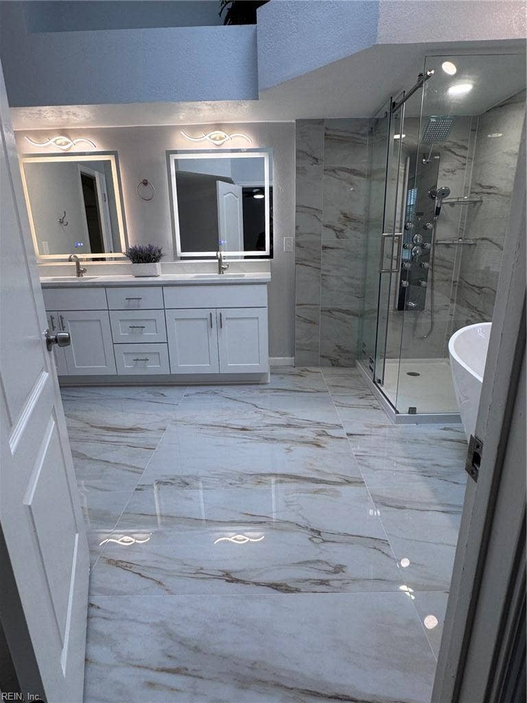 3024 Red Maple Lane, Lynnhaven Woods, Virginia Beach, VA 23452 Primary bath - look at that gorgeous tile - very functional and yet absolutely beautiful