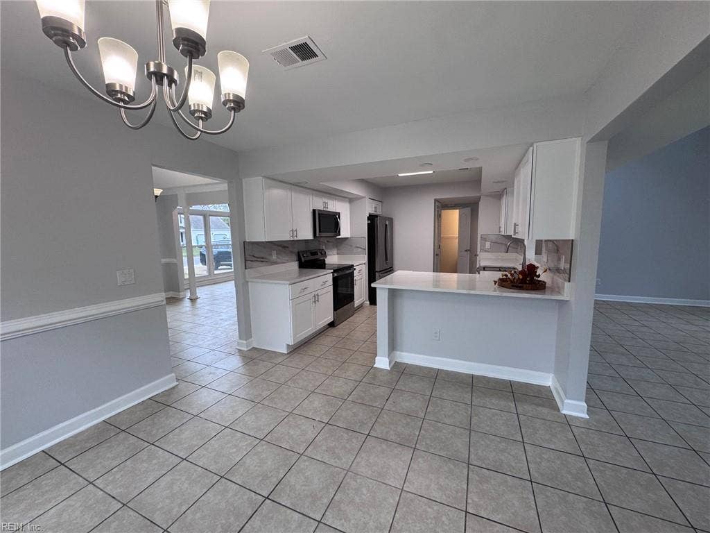 3024 Red Maple Lane, Lynnhaven Woods, Virginia Beach, VA 23452 View from eat-in kitchen area to kitchen bar/island