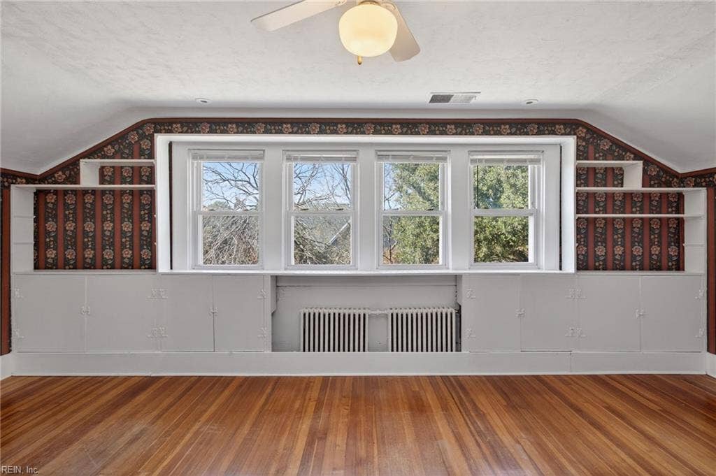 Primary bedroom covers the length of the second floor