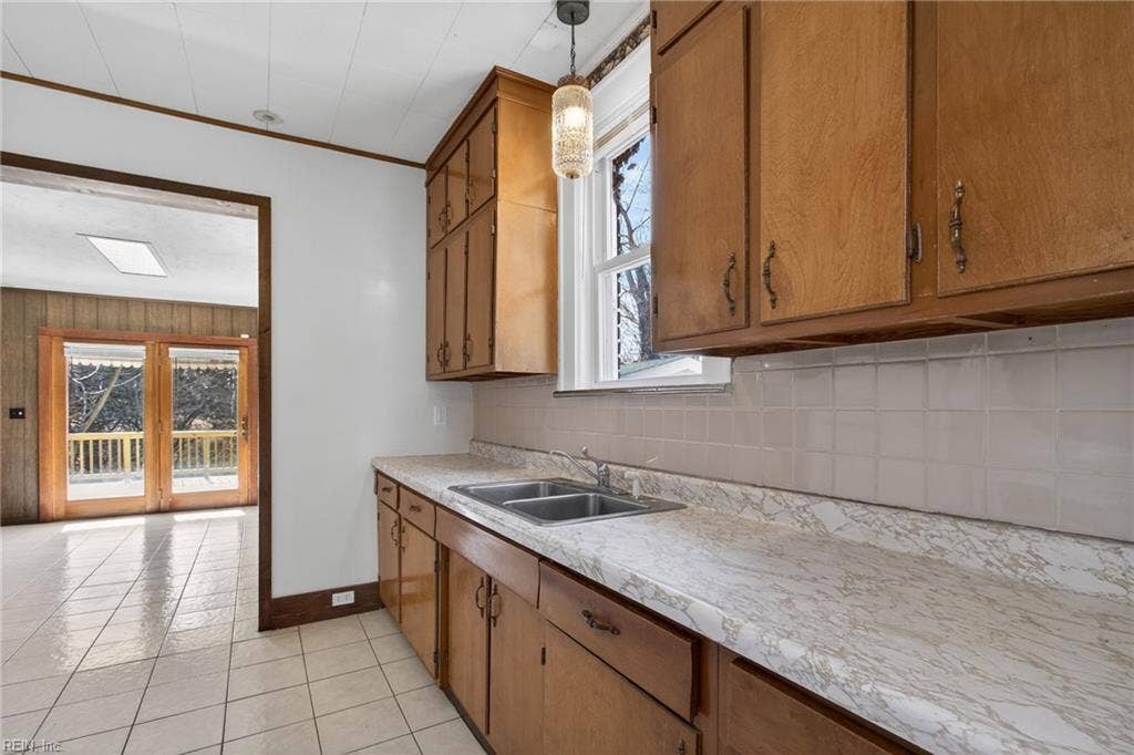 Pass through kitchen looking to rear of home and family room