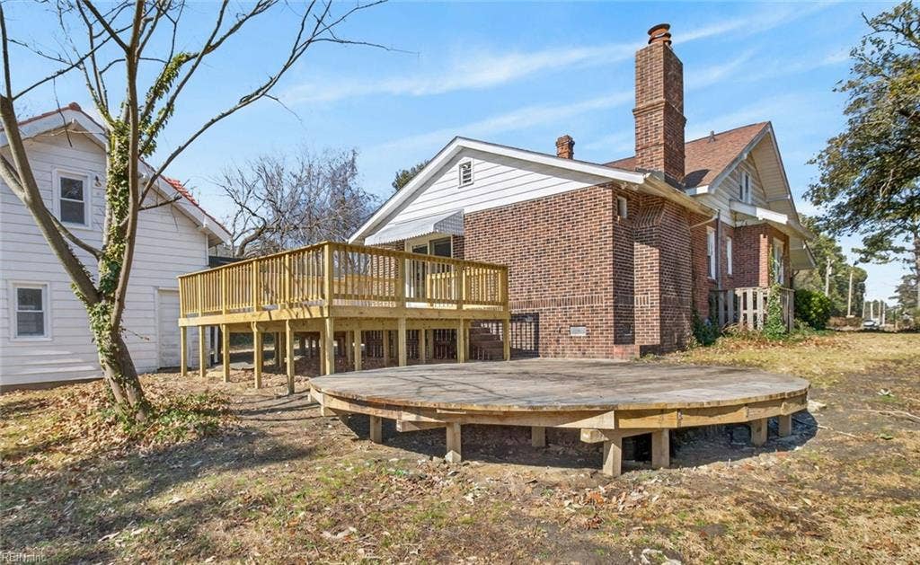 New wood deck; existing circular wood platform suitable for pool or gazebo