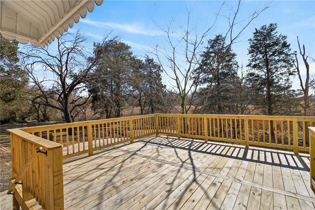 Deck overlooks Broad Ck and  large yard which provides peaceful outdoor living