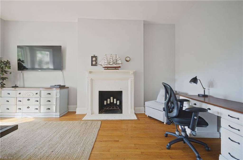 Living room with decorative fireplace
